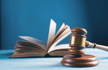 open book on brown wooden table